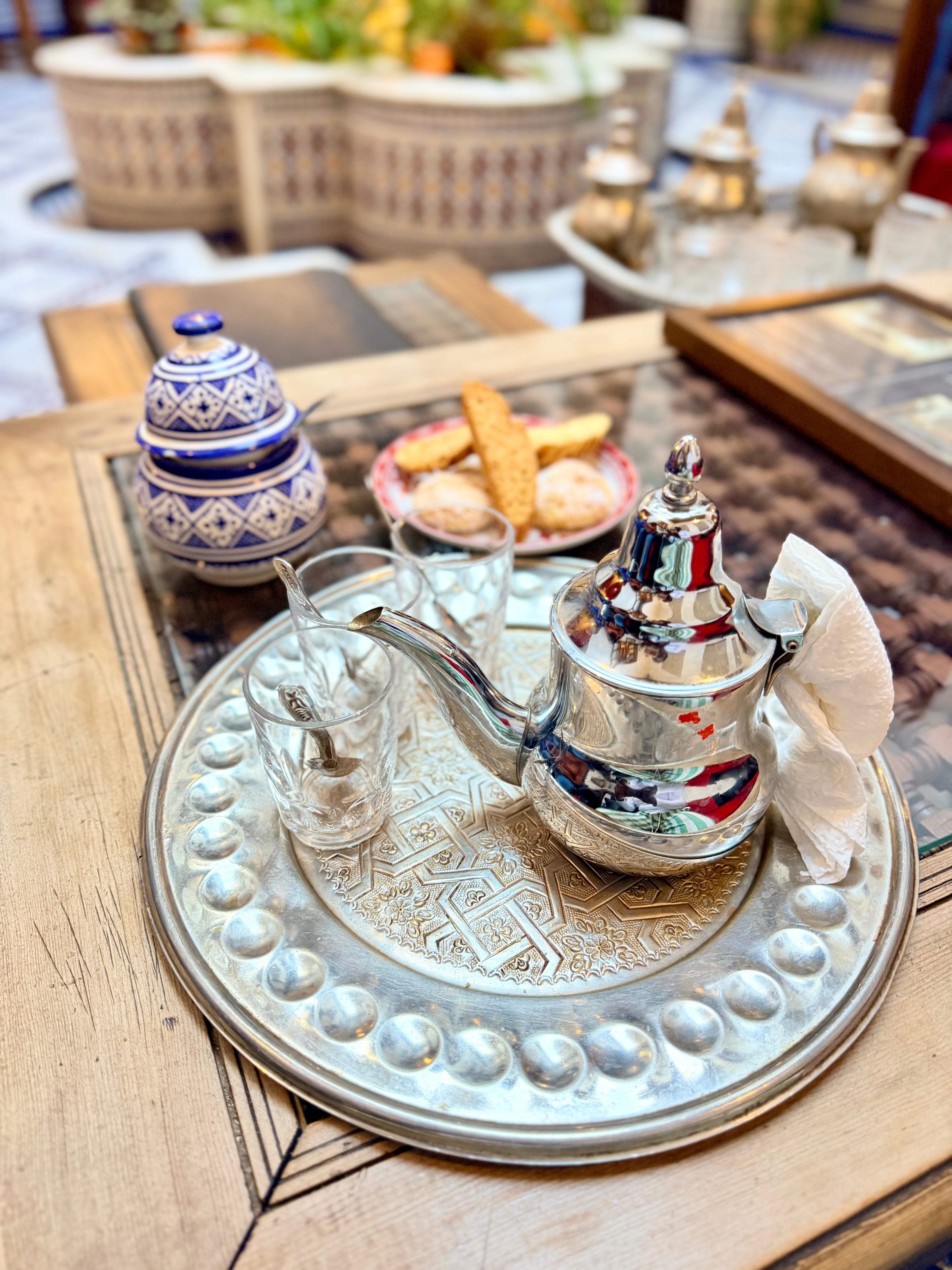 Greeted with Moroccan tea and treats. 