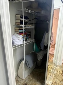 One of the closets with owner belongings