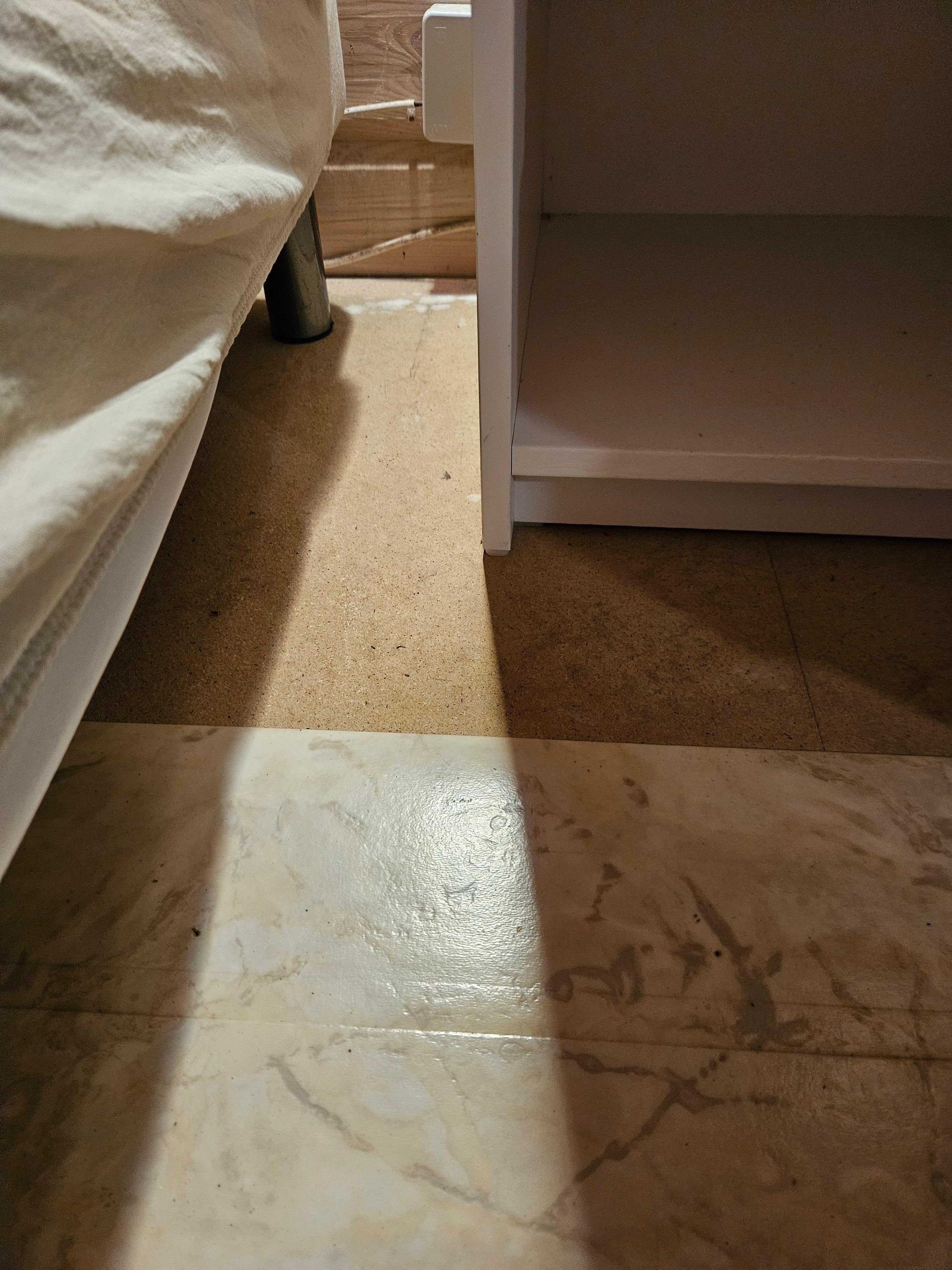 Missing flooring in part of the room. 