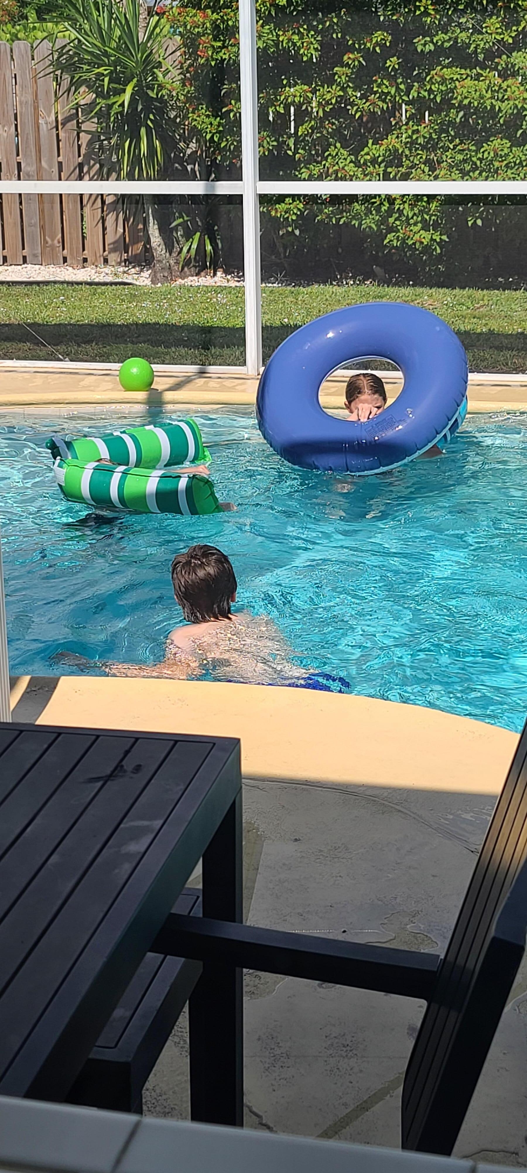 Kids having fun in the pool