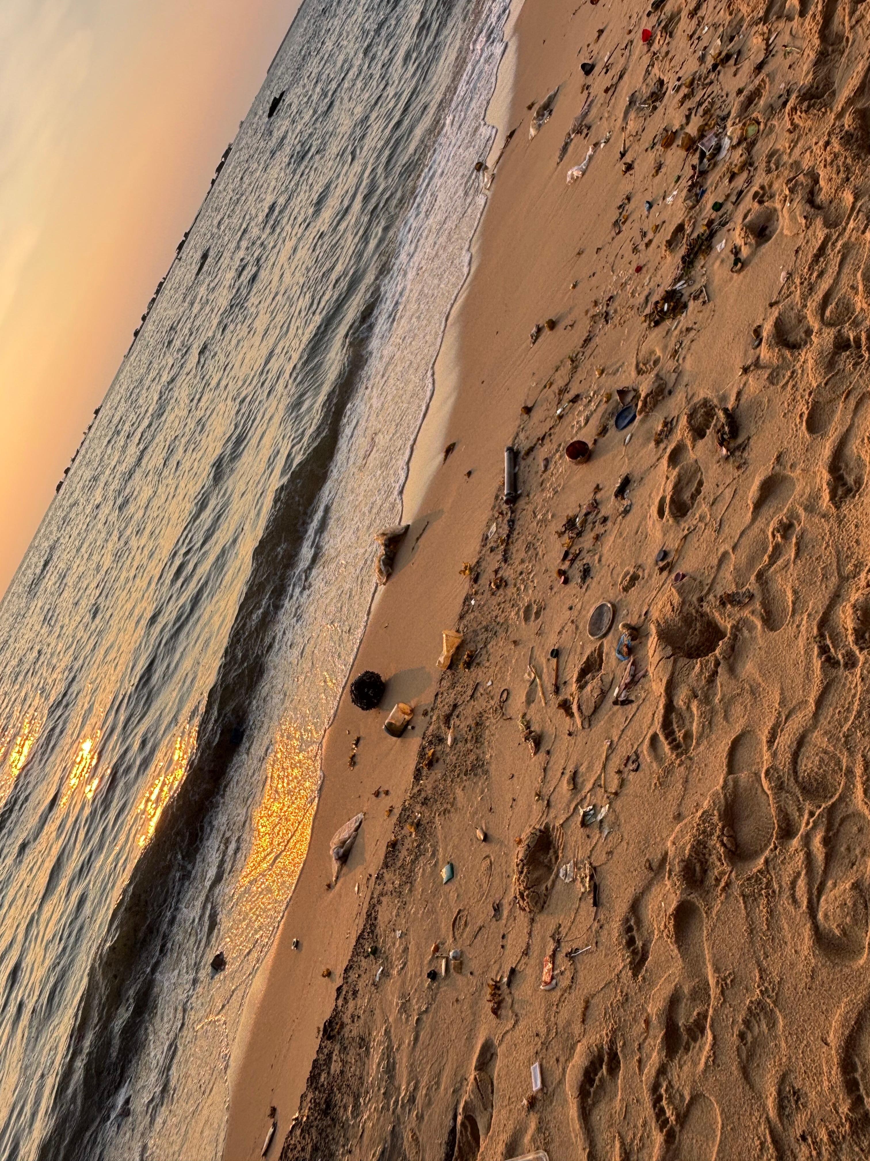 Garbage littering the beach. 