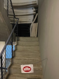 Cushions and chain blocking stairs
