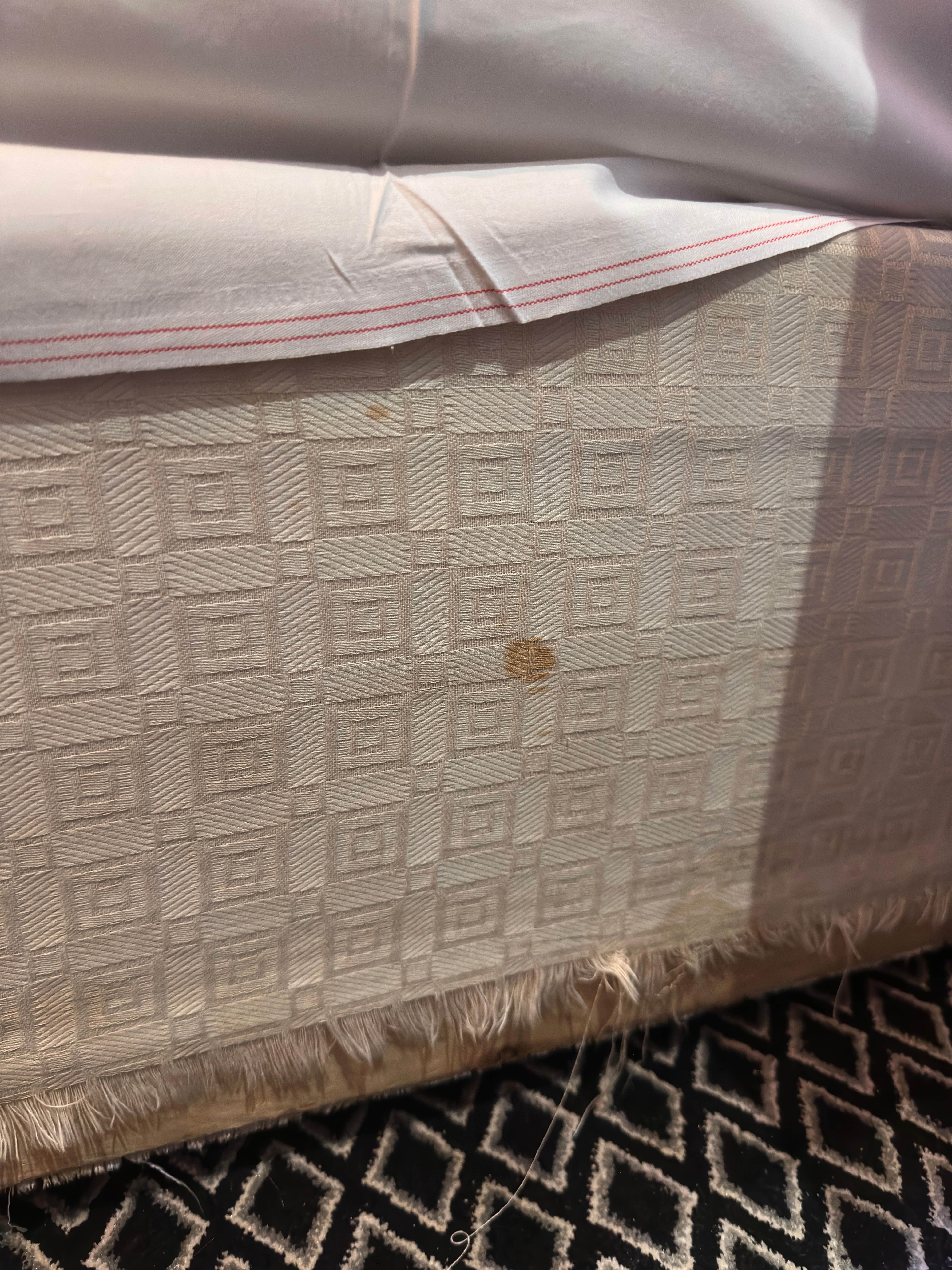 Bed with “luxury Egyptian sheets”