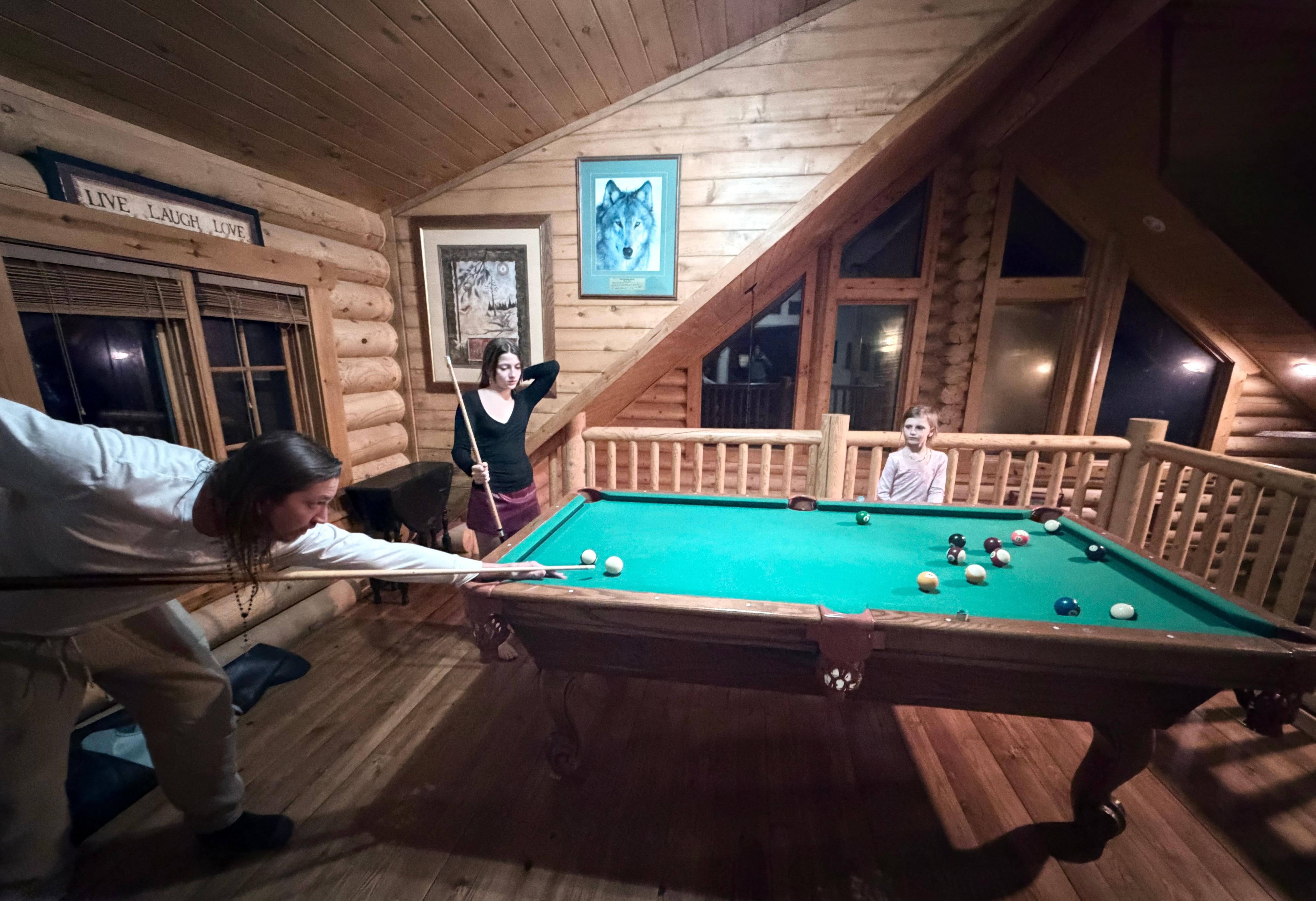 The pool table provides lots of family fun!