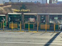 Entrance door is directly across the street from here.