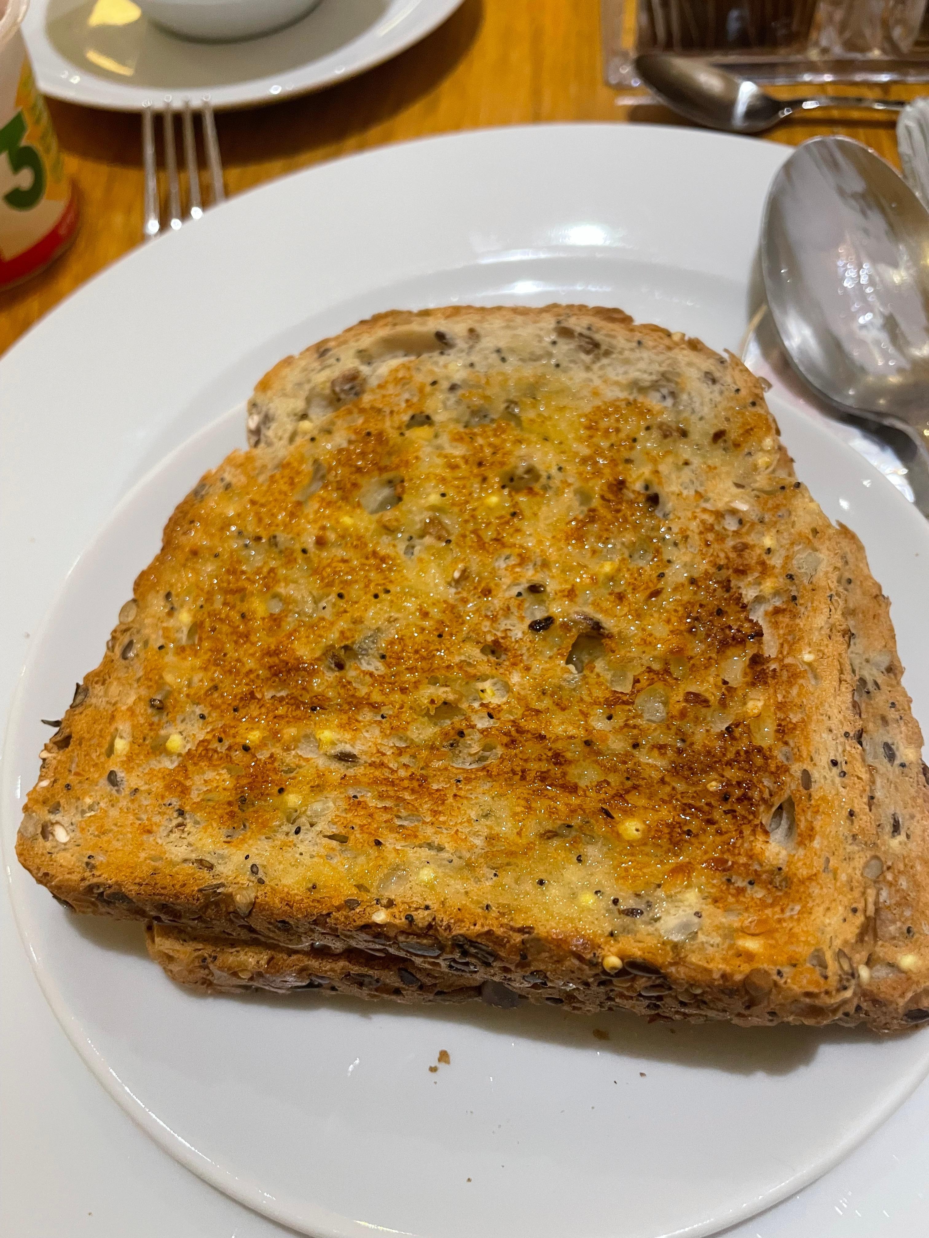The most delicious toast from the cafe.  The Server called it "Brown Toast", but it was more like Multigrain, so yummy with Tea.