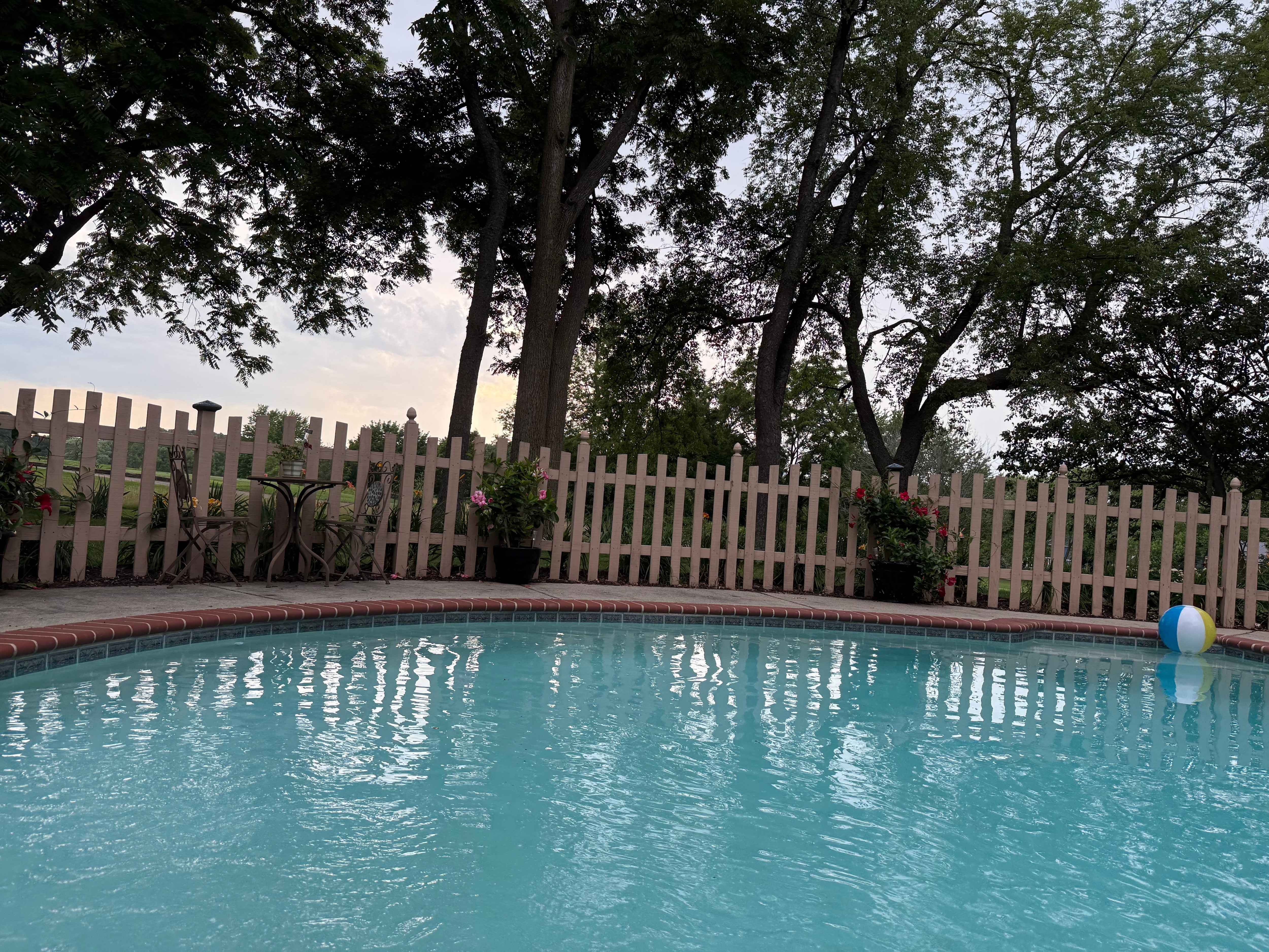 View of golf course beyond the pool. 