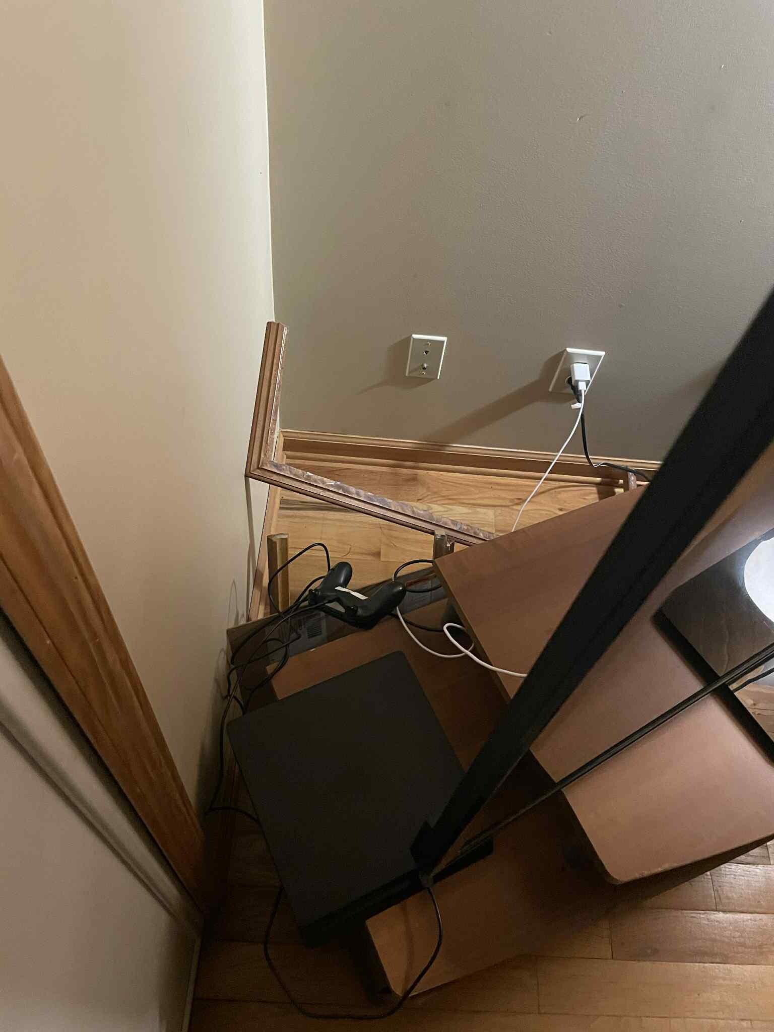 Trash behind tv