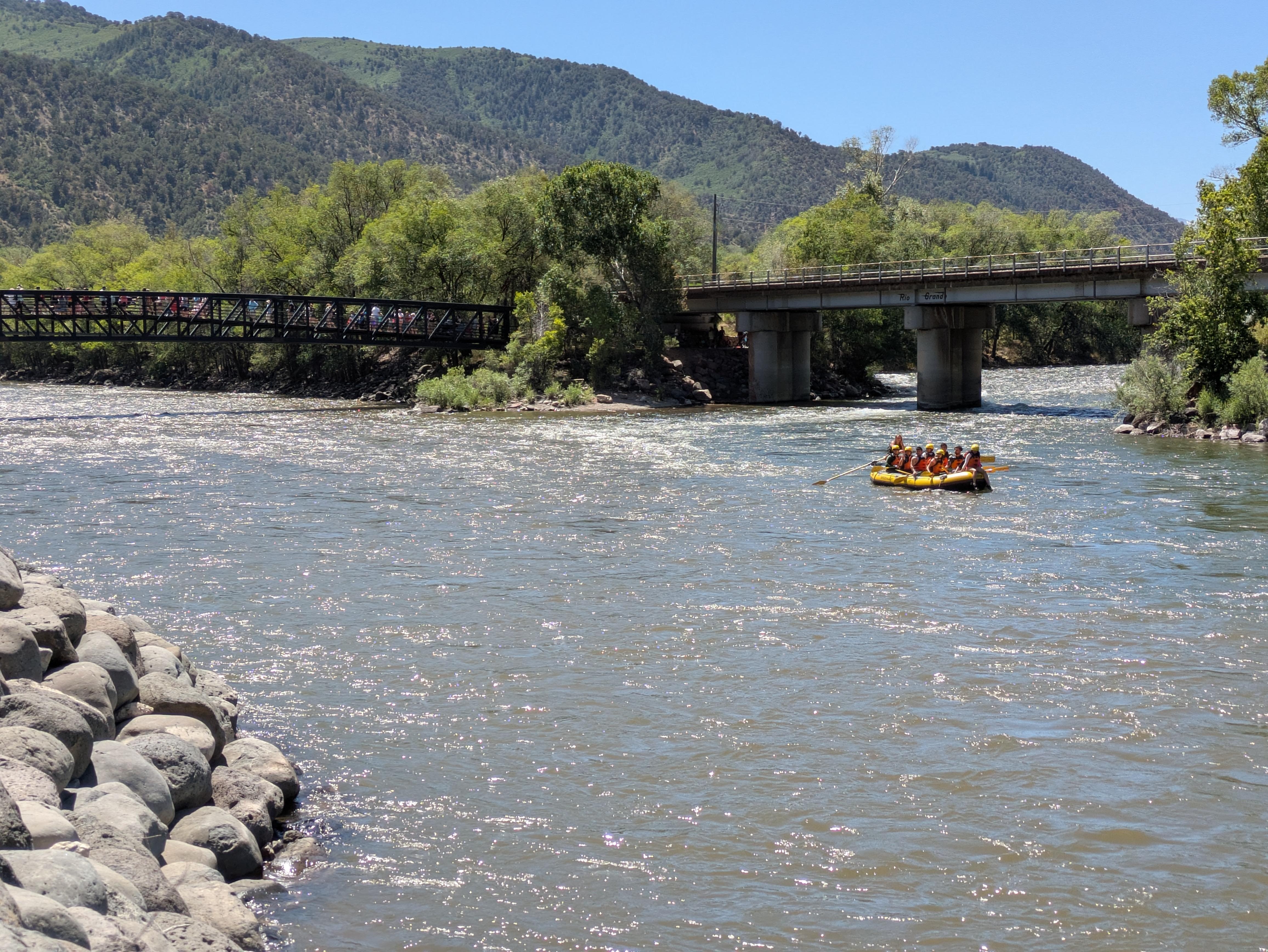 Two Rivers Park trail. The pedestrian bridge to downtown Glenwood Springs is on the left and white water rafting on the river. All minutes from the condo.