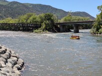 Two Rivers Park trail. The pedestrian bridge to downtown Glenwood Springs is on the left and white water rafting on the river. All minutes from the condo.
