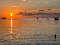 Sunset Cove beach view of the sunset.