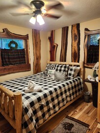 Very comfy bed. The cute tree logs gave the room a warm rustic feel.