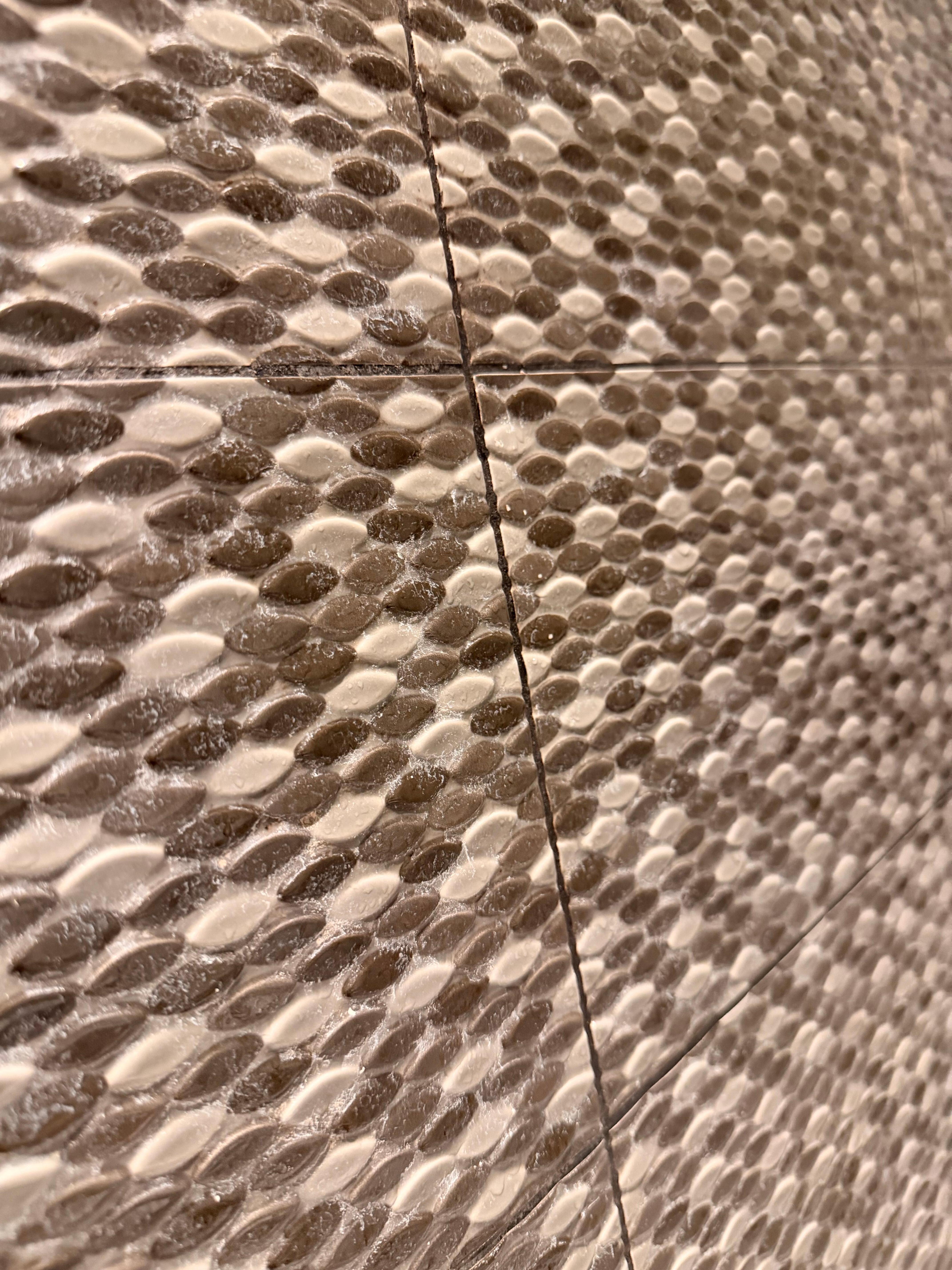 Tiles at side of shower