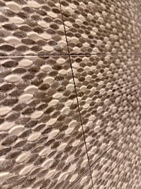 Tiles at side of shower