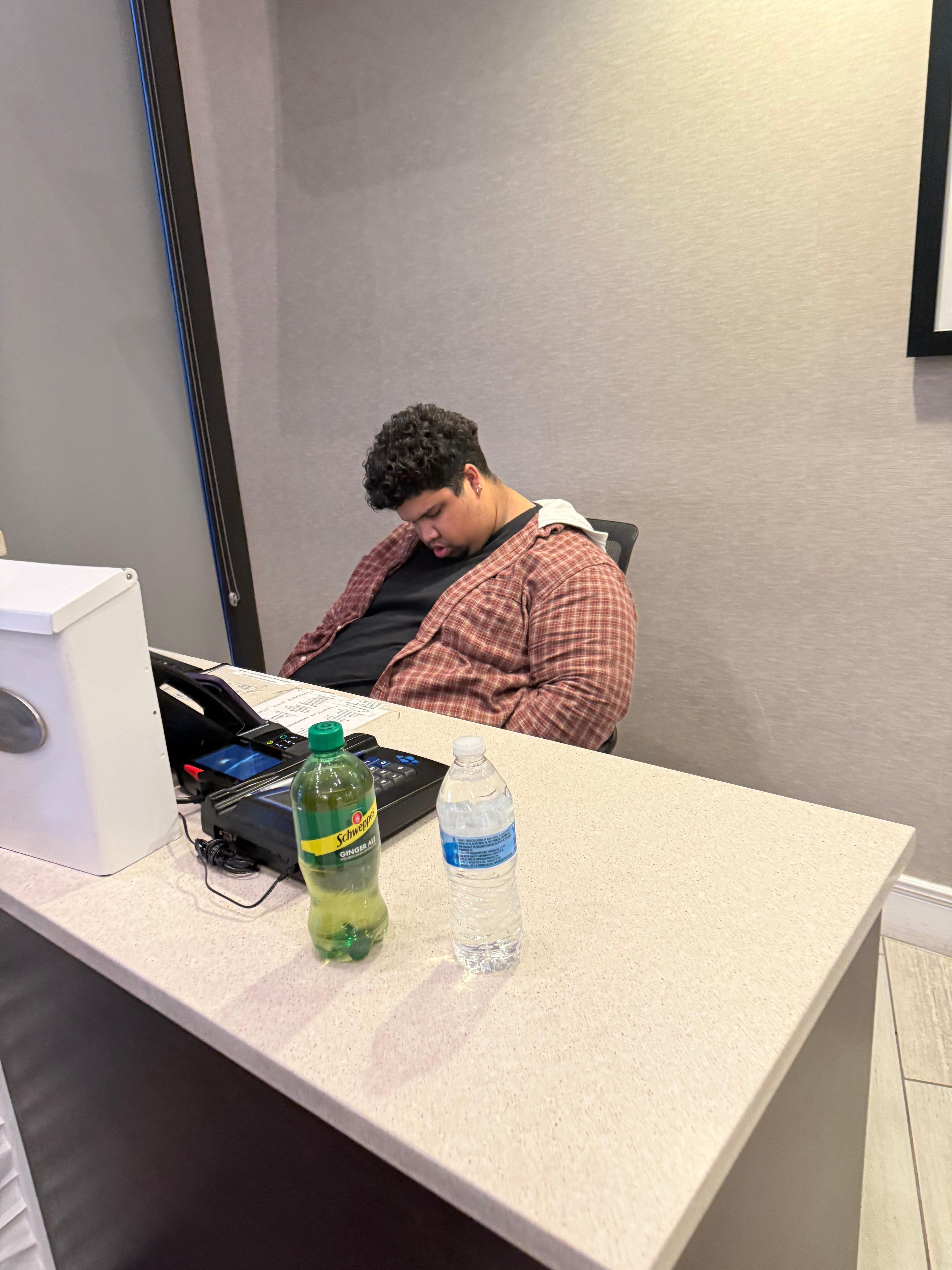 0550 clerk is sleeping I pass by to my car 