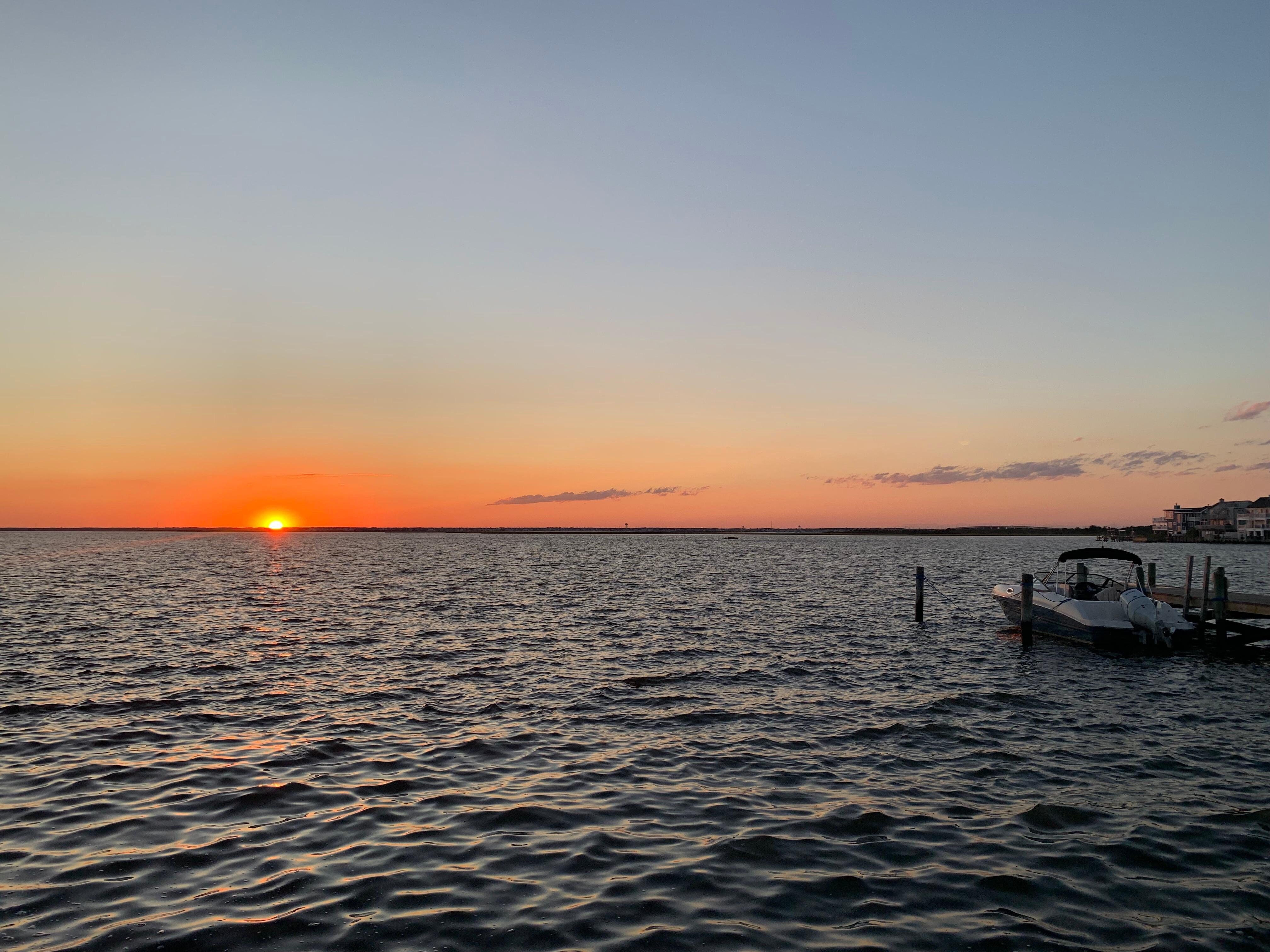 We walked two houses away to enjoy beautiful sunsets at the bay.