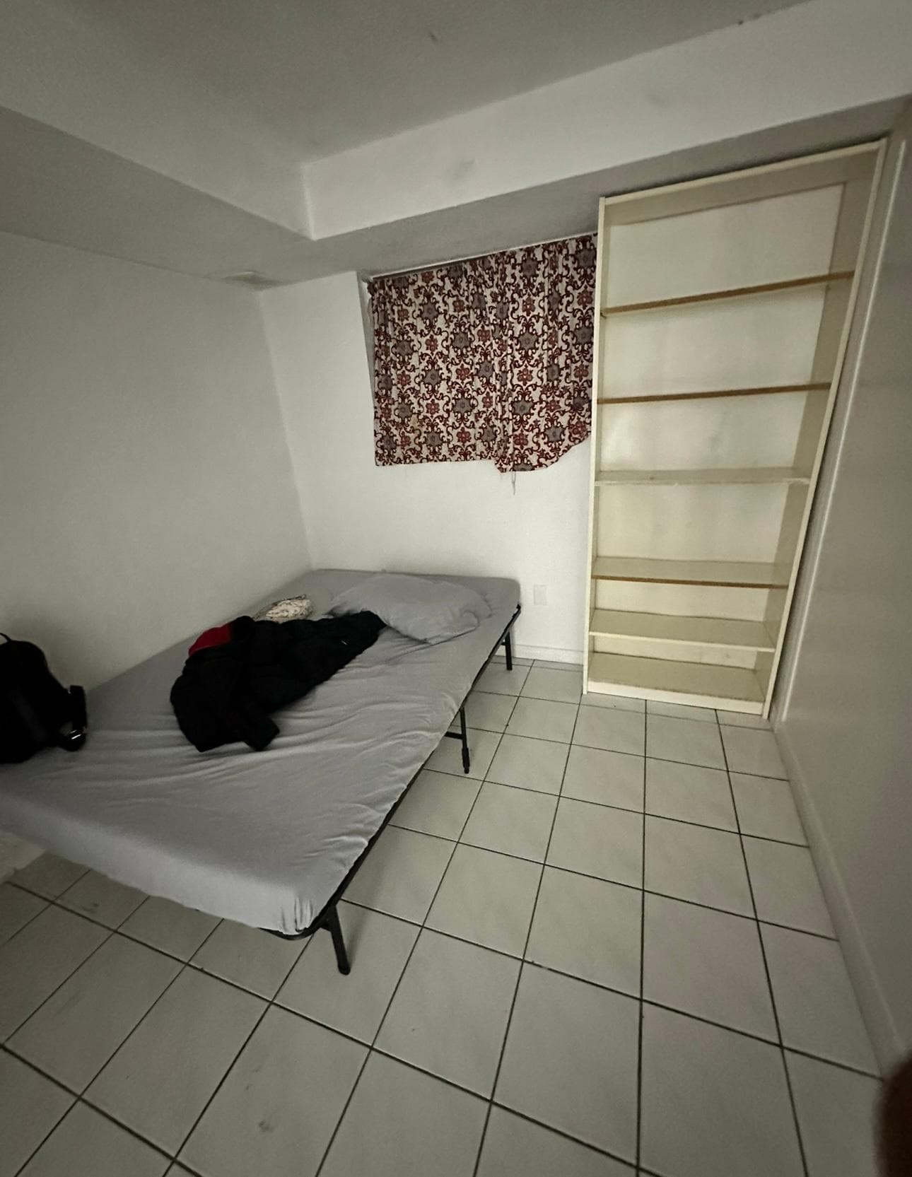 The mattress was hard. The bed had only a bed sheet with this old comforter.