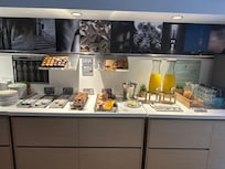 Pastries, cereal and juices at breakfast