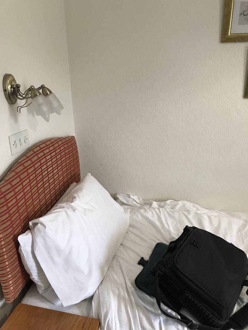 First bed in room.