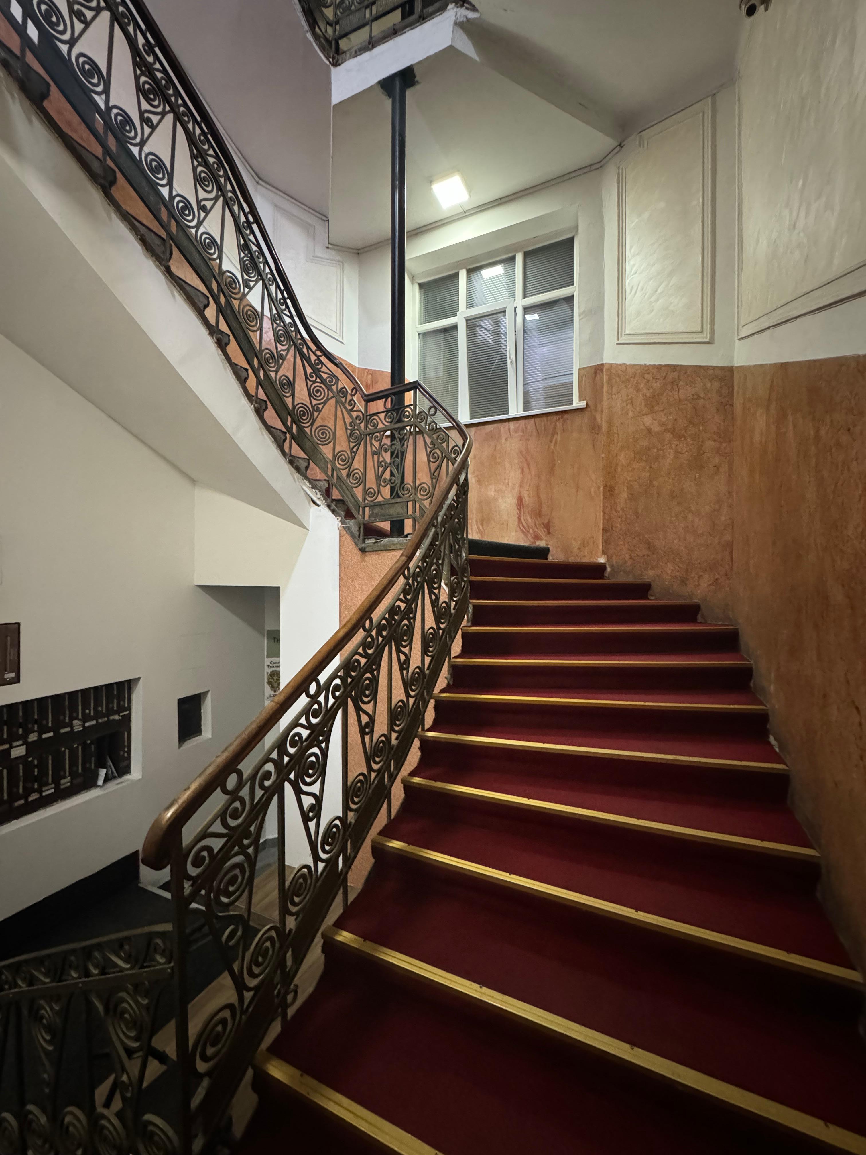 Stairs up to reception and rooms