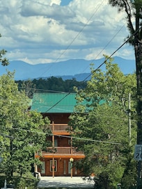 The landscape trees/bushes have gown since the picture in the ad.