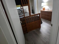 Spare room with full on bottom bunk bed with two on top