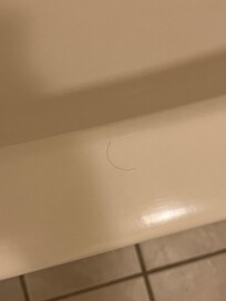 Hair on the tub wasn’t ours.