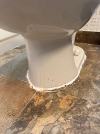 Dirty toilet, poor installation.