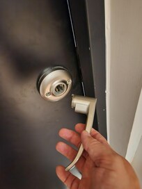 Door handle fell off when we closed the door, trapping us inside.