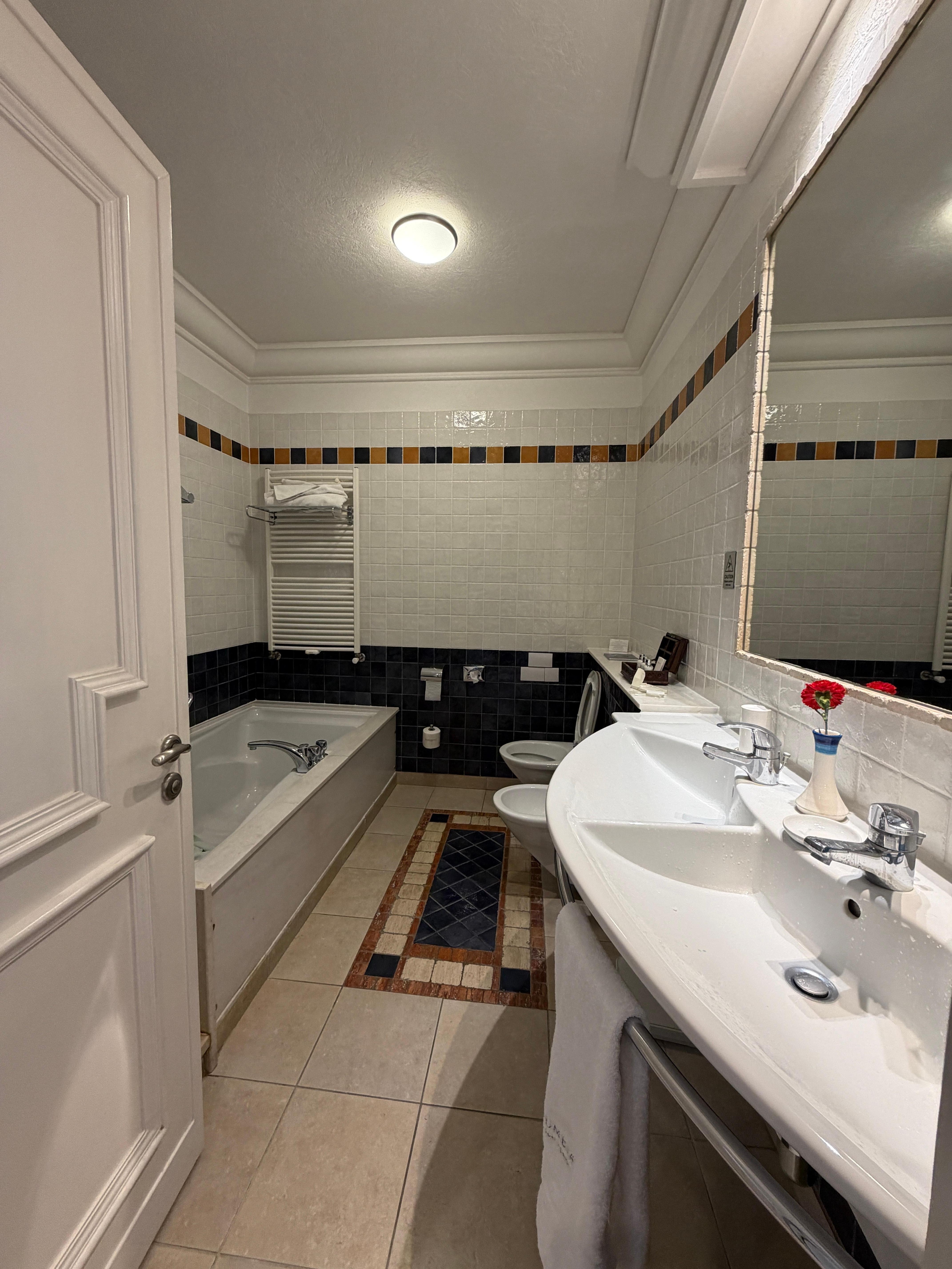 Bathroom with bath and separate shower
