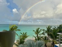 Coffee and rainbows from the balcony