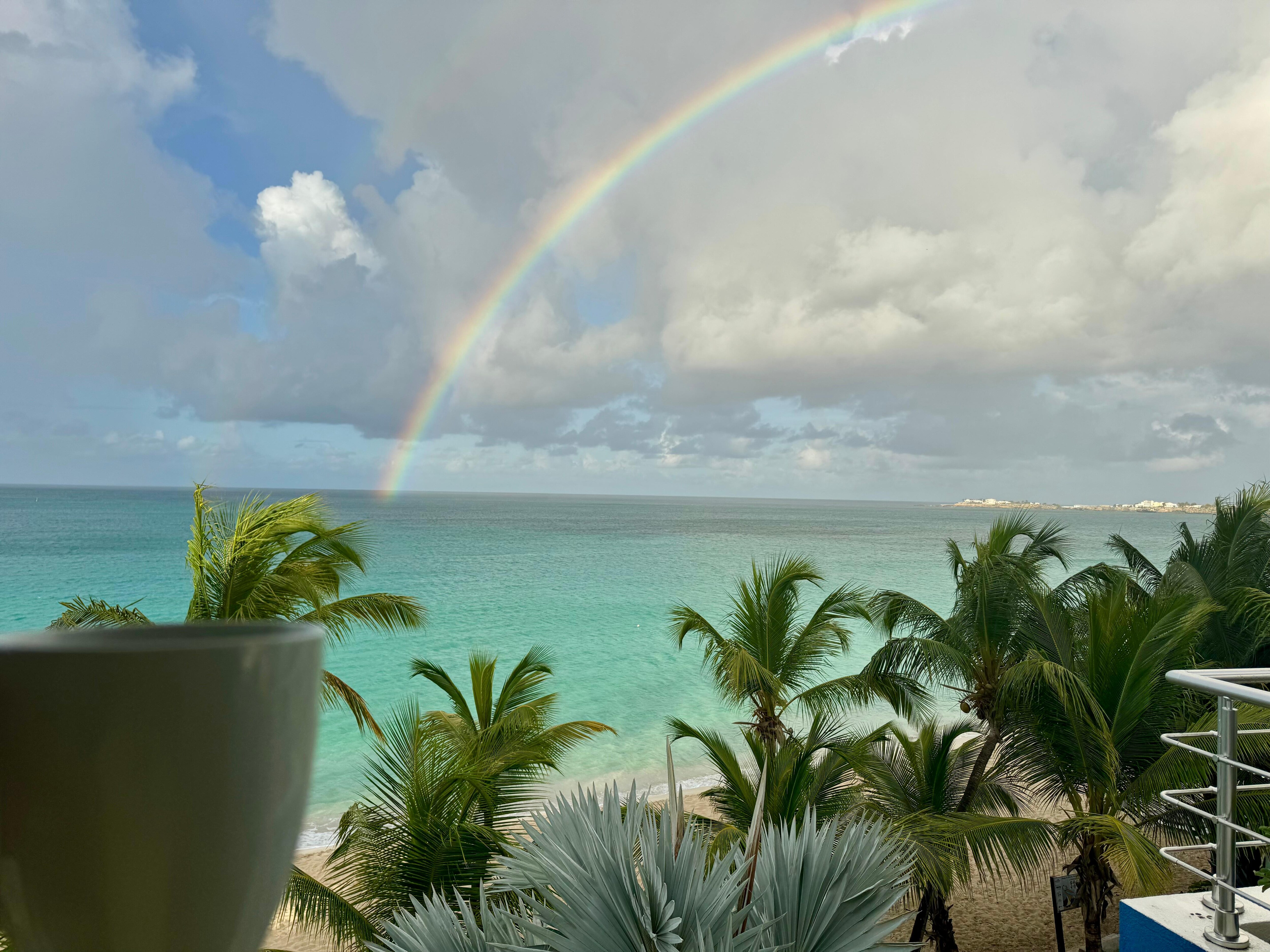 Coffee and rainbows from the balcony