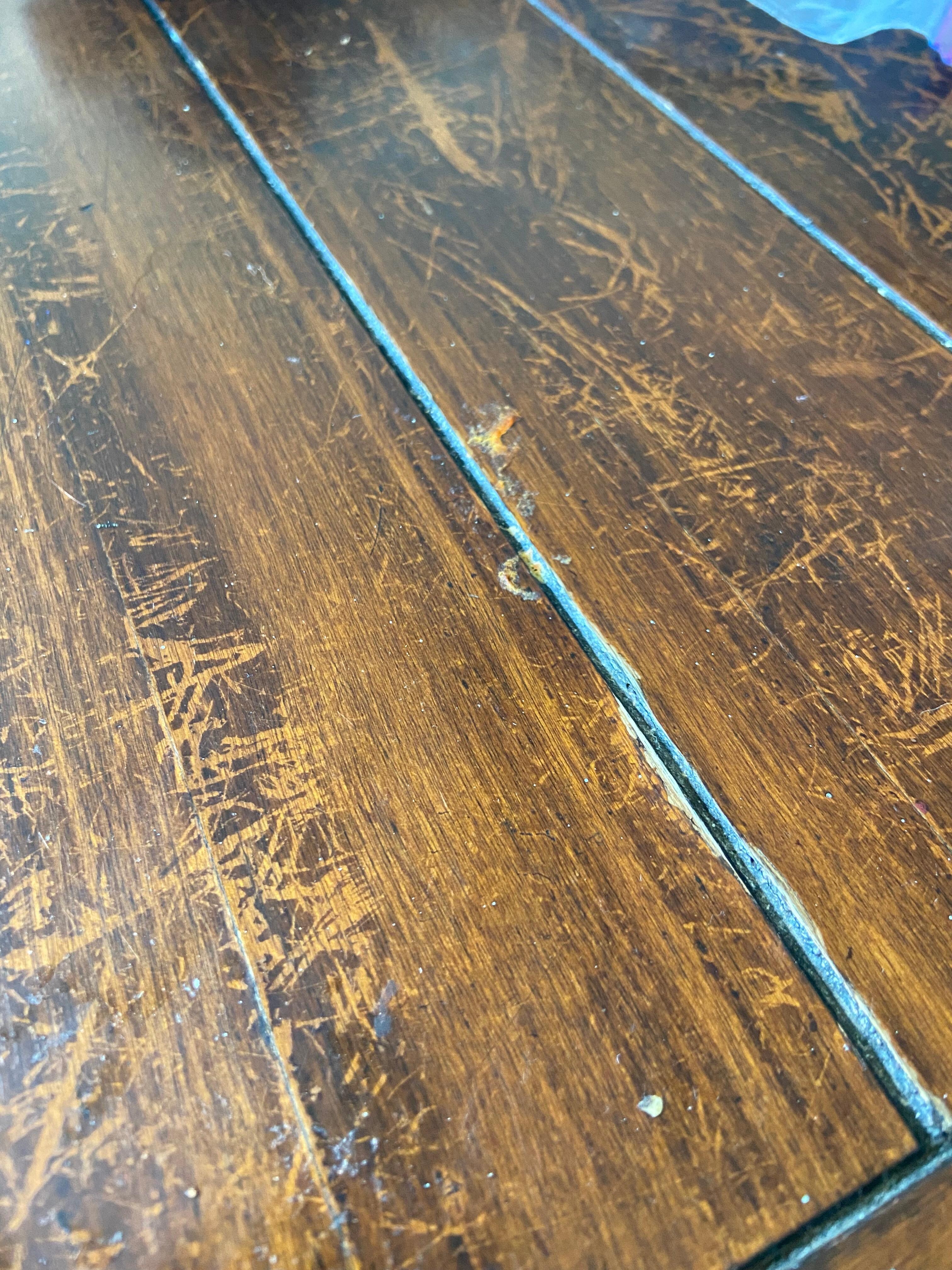 Pizza sauce (?) dried on countertops. 