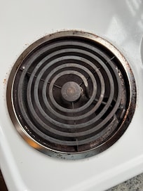 Aged, rusted and stained burners (just one of four that are the same)
