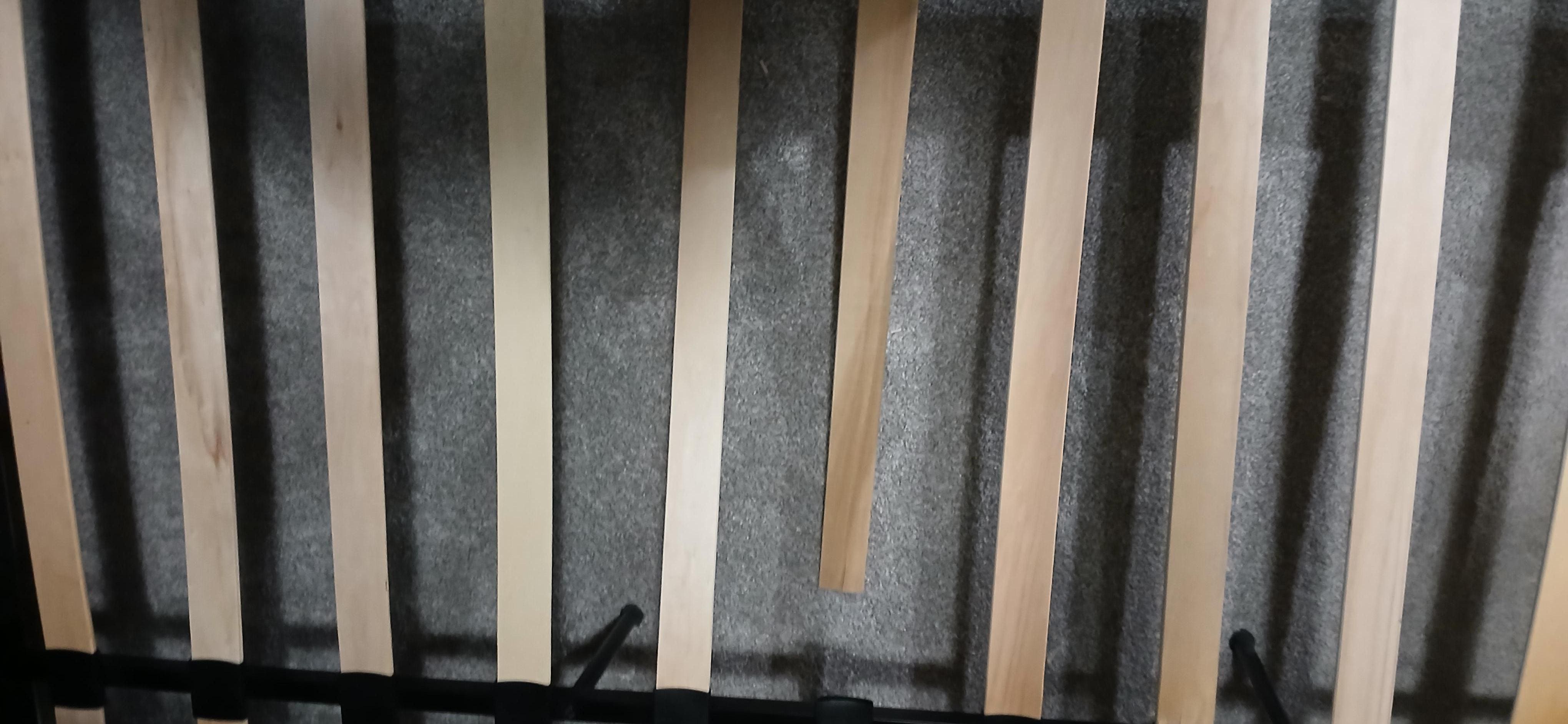 Broken frame slats in the double bed. 