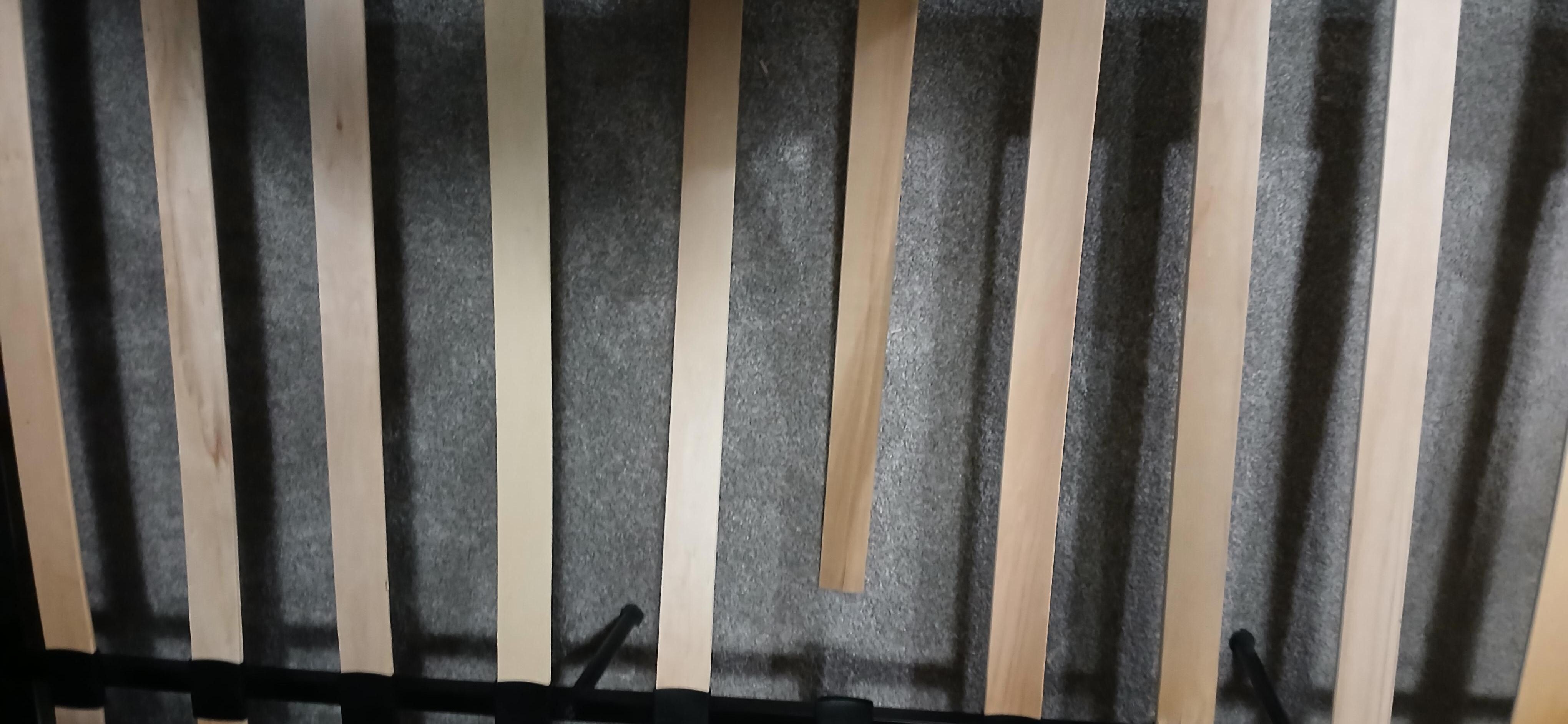 Broken frame slats in the double bed. 