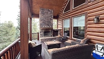 Outdoor patio with fireplace.