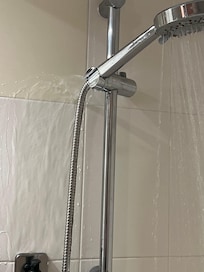 Shower still leaking from the back after they fixed the position, as was not holding