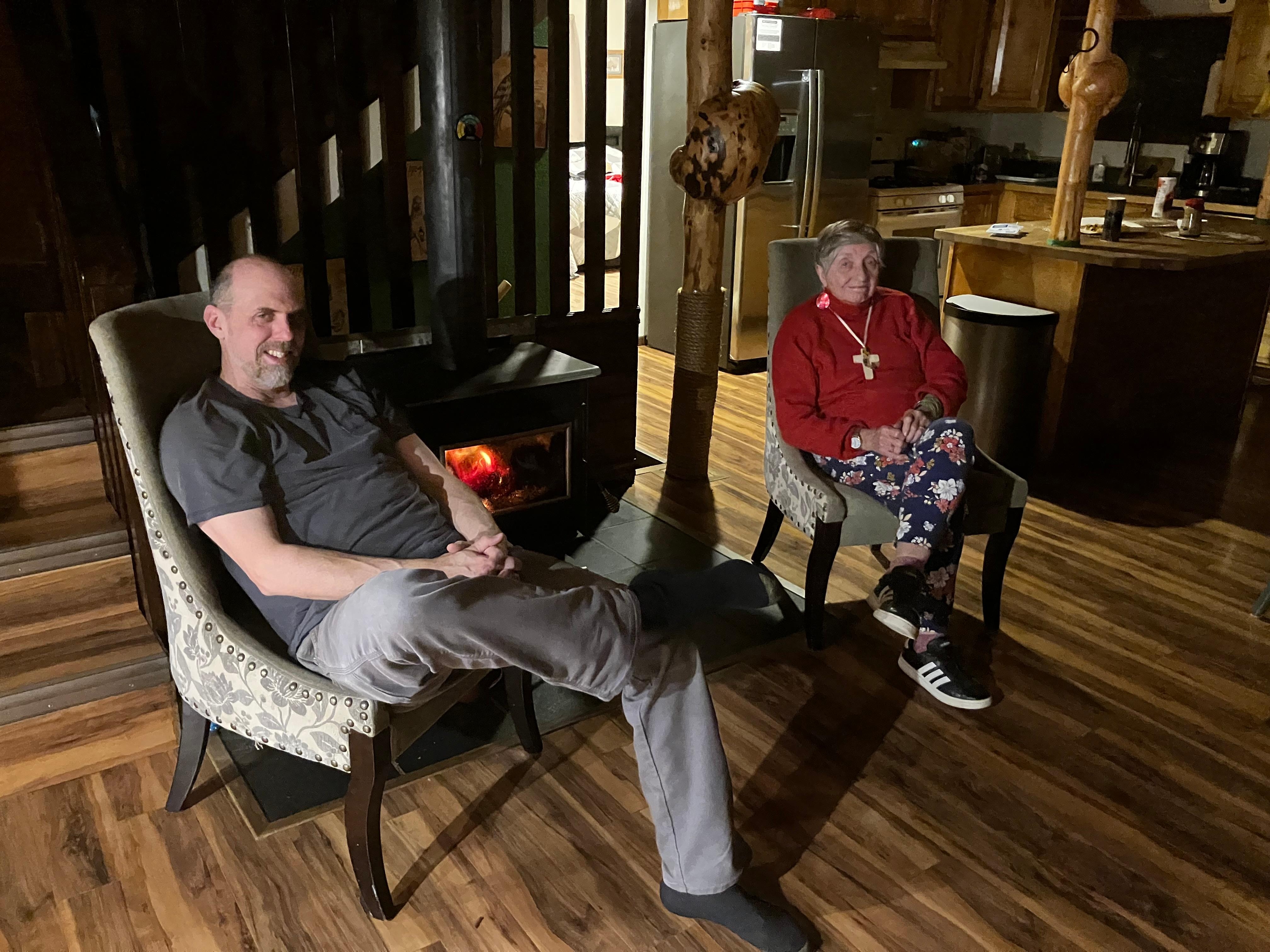 Watching the lights on the snow by the stove with grandma