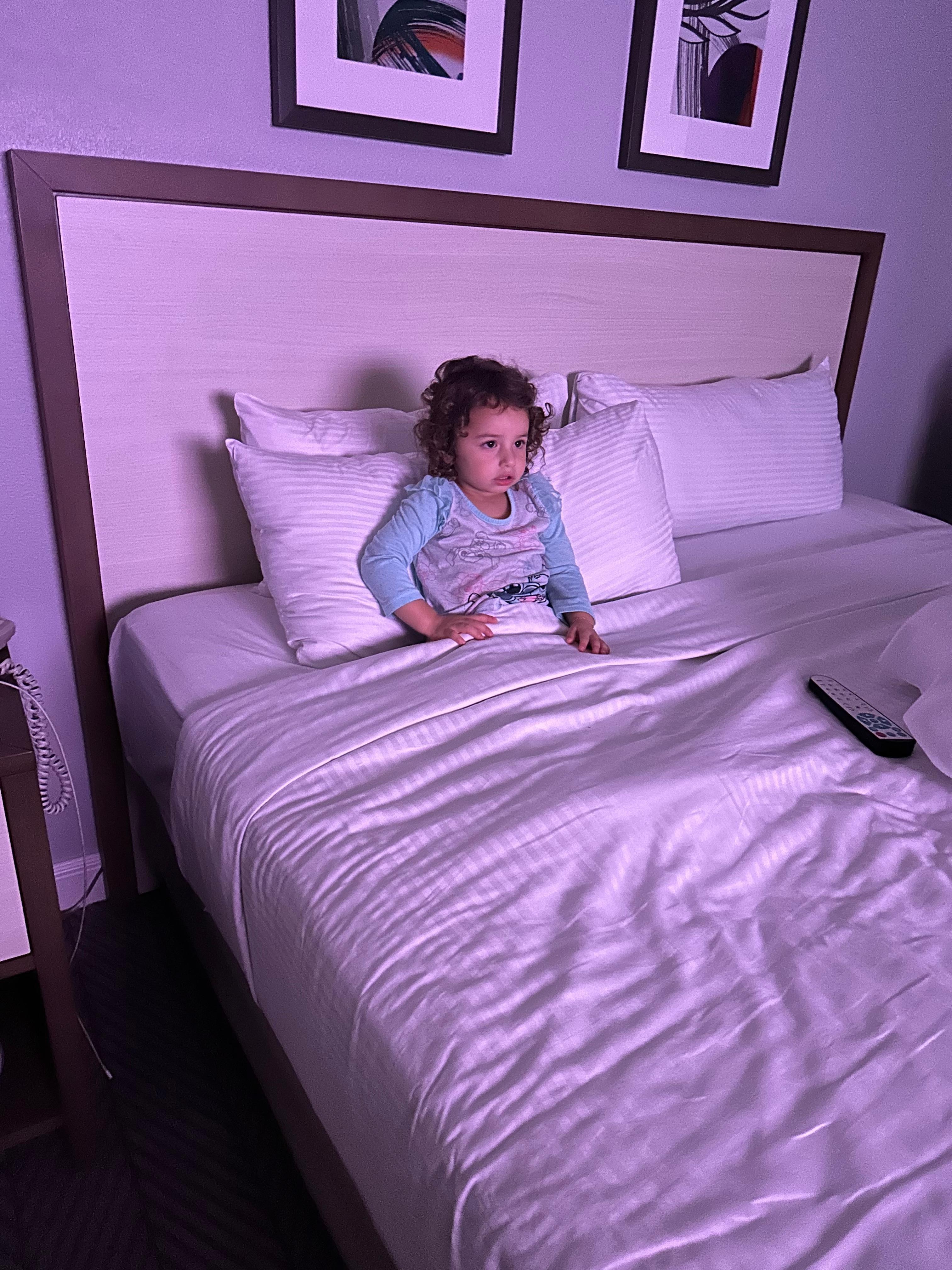 Baby girl testing out the bed