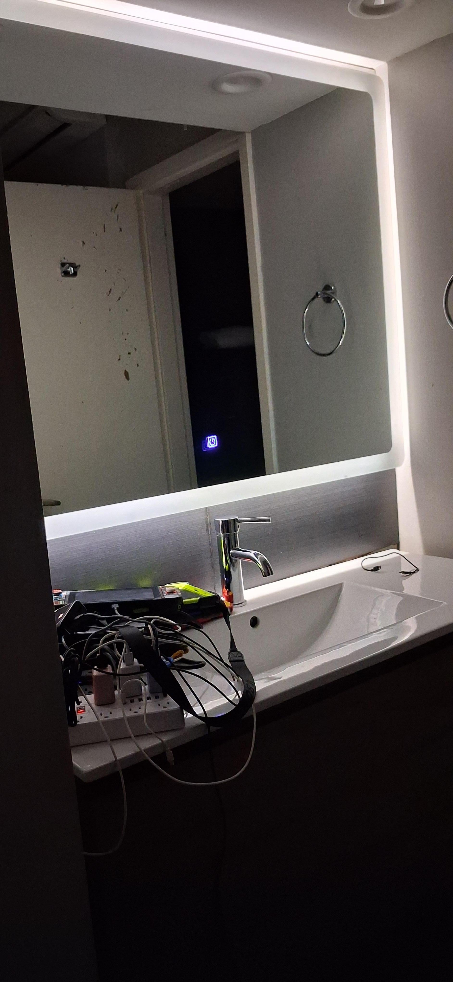 The mirror that stayed on all night and we couldn't shut it off. The touch button wouldn't work. I have a video of all this stuff.