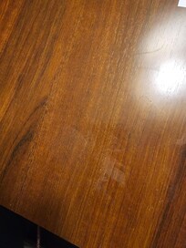 Water marks on the bedside table that once wiped with a damp cloth came off..