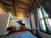 Half my room. Note the stained glass windows.