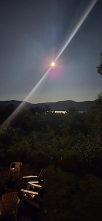 Full moon over lake.