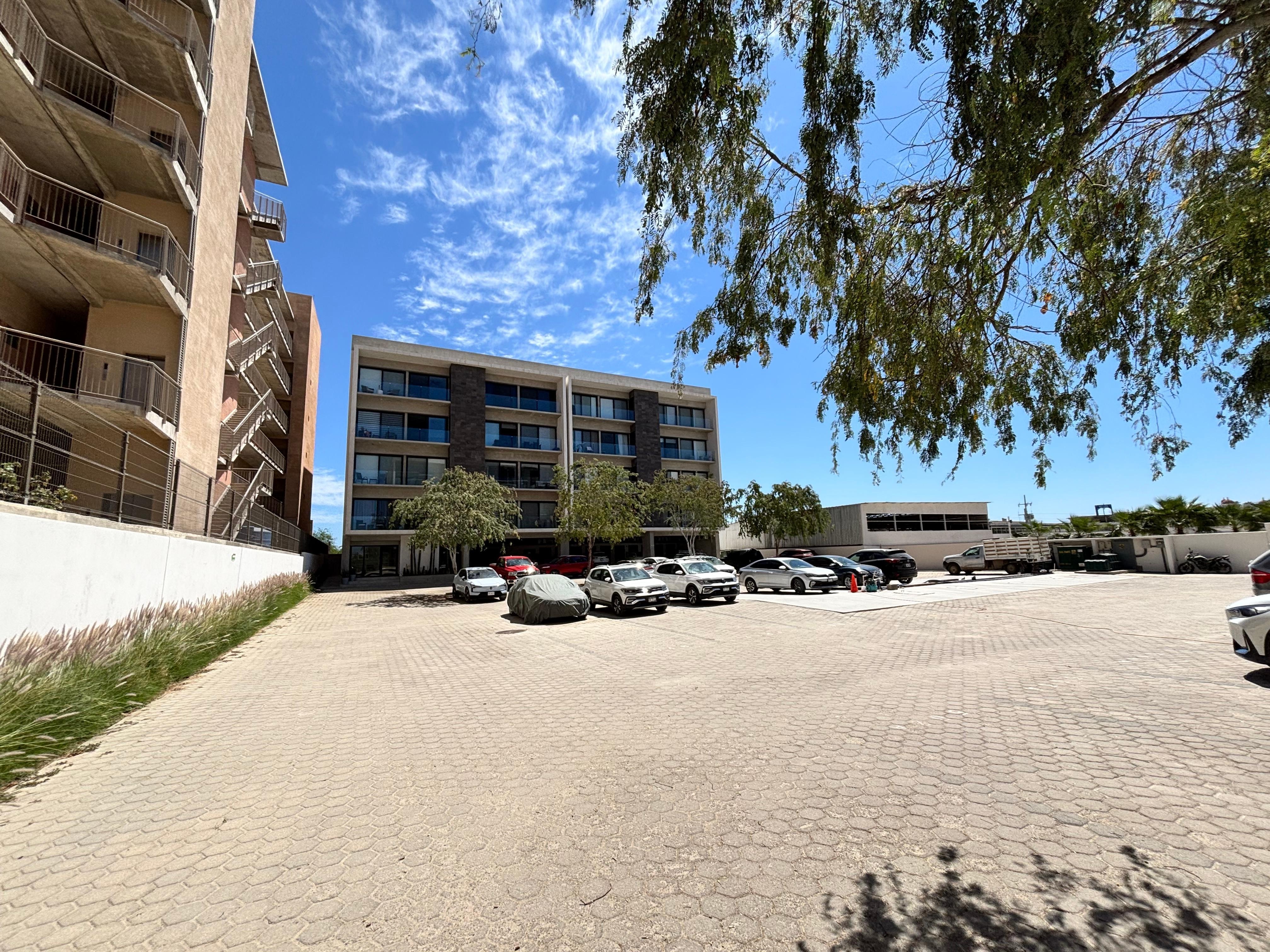 Parking in front of building. Gated entry