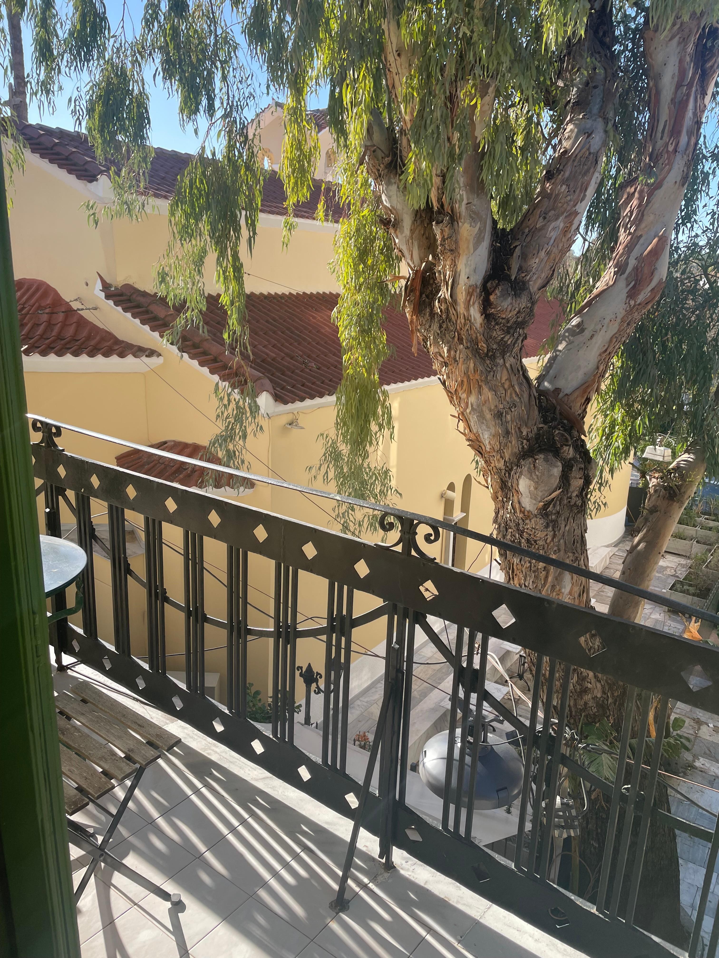 The view from our balcony— a very old church next door. 
