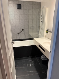 Shower and sink separate from the toilet