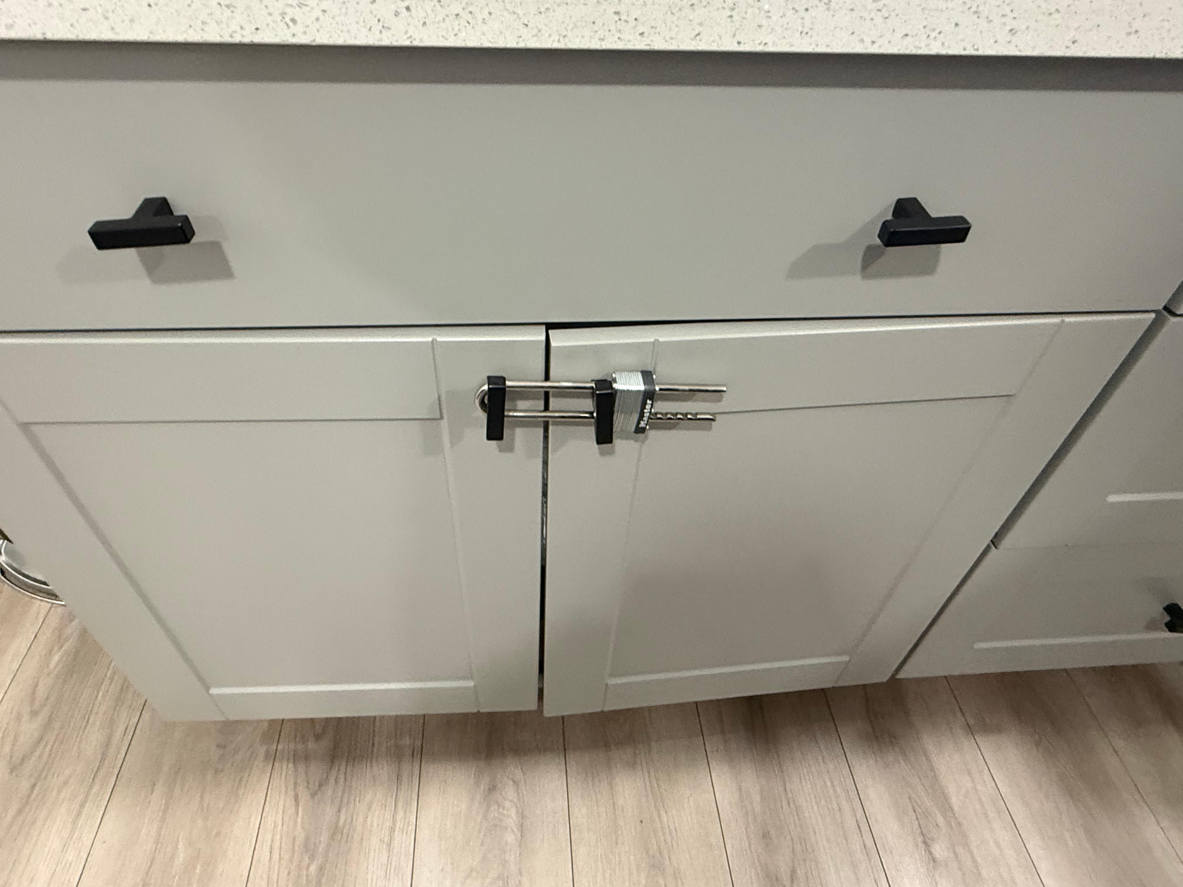 Cabinet had a lock no access to the dishes 