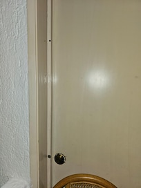 Screwed door shut because people in other room came in roaming around.
Good thing 1 of us was in room. No apologies