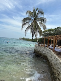No beach here… ( beach is literally 15 feet long )just slippery concrete next to ocean